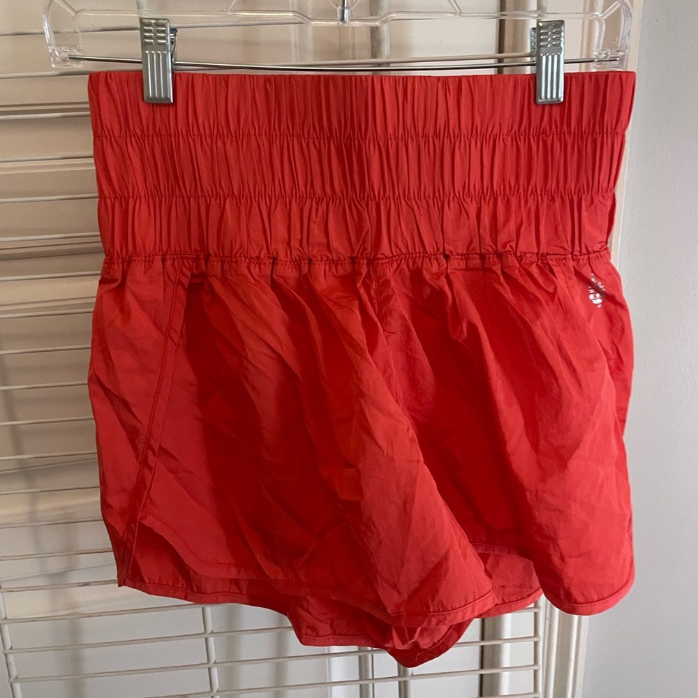 bright orange/pink/coralish free people movement shorts